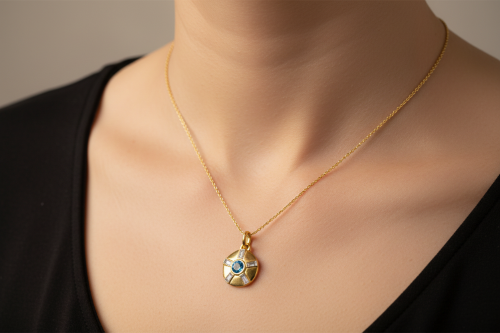 gold plated necklace with blue topaz